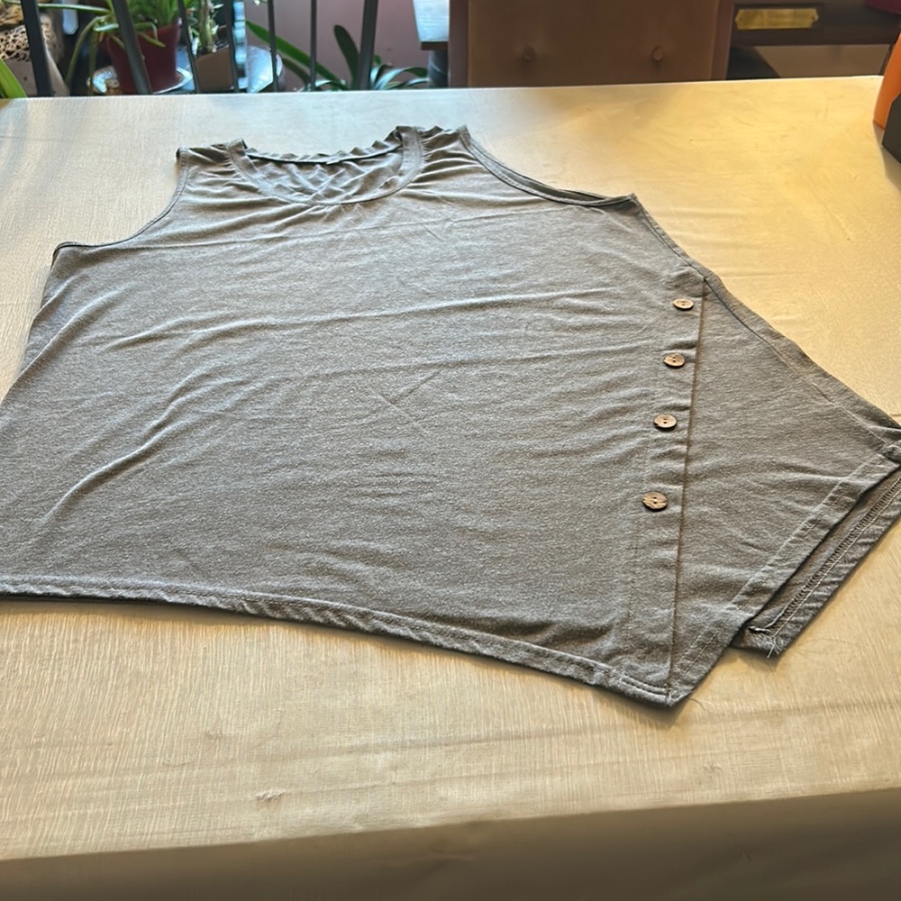 Gently worn asymmetrical top size 2X